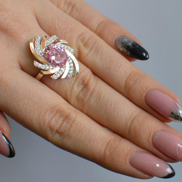 Срібна каблучка з золотими вставками