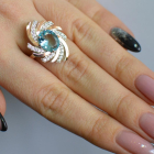 Срібна каблучка з золотими вставками