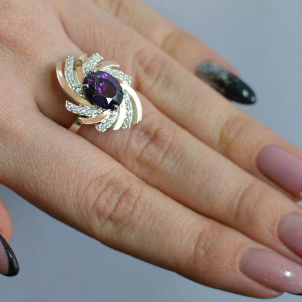 Срібна каблучка з золотими вставками