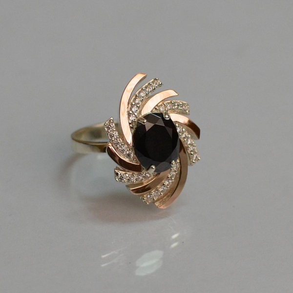 Срібна каблучка з золотими вставками