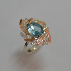 Срібна каблучка з золотими вставками