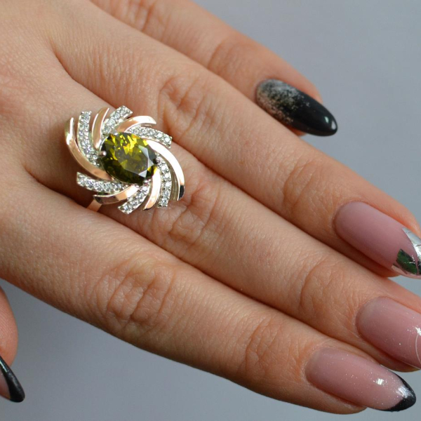 Срібна каблучка з золотими вставками