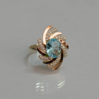 Срібна каблучка з золотими вставками