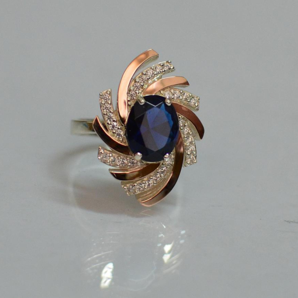 Срібна каблучка з золотими вставками