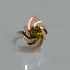 Срібна каблучка з золотими вставками