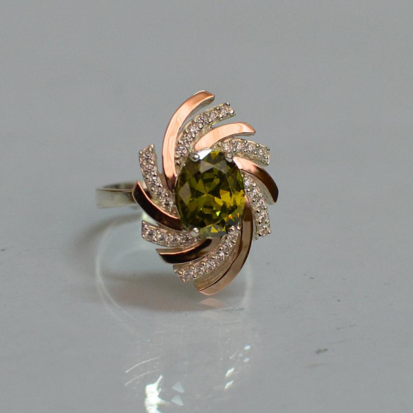 Срібна каблучка з золотими вставками