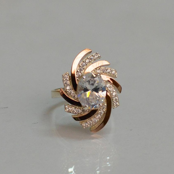 Срібна каблучка з золотими вставками