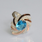 Срібна каблучка з золотими вставками