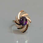 Срібна каблучка з золотими вставками