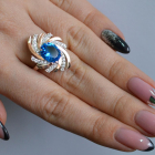 Срібна каблучка з золотими вставками