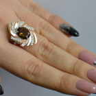 Срібна каблучка з золотими вставками