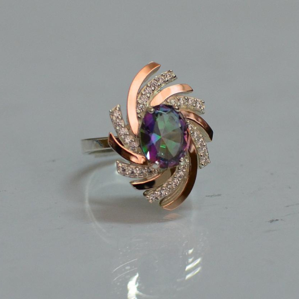 Срібна каблучка з золотими вставками