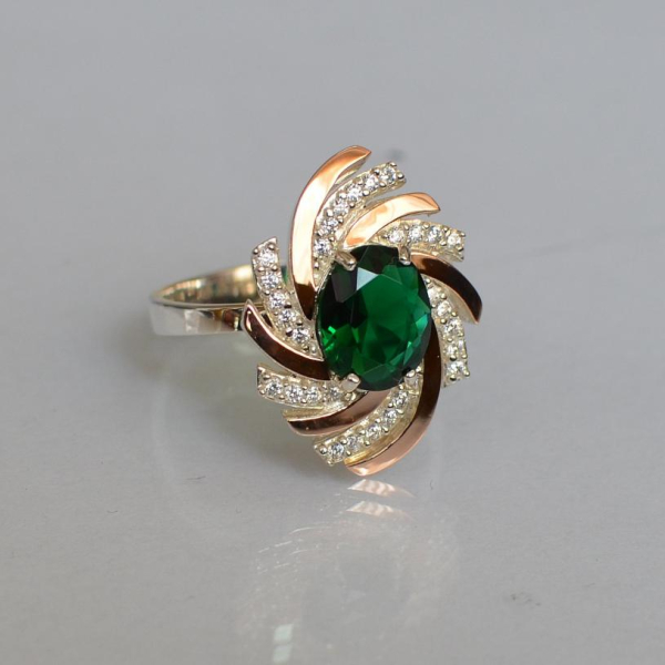 Срібна каблучка з золотими вставками