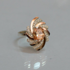 Срібна каблучка з золотими вставками