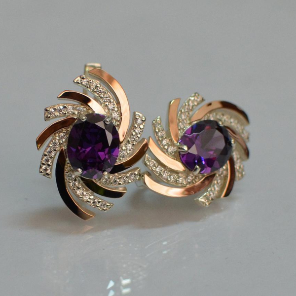 Срібні сережки з золотими вставками