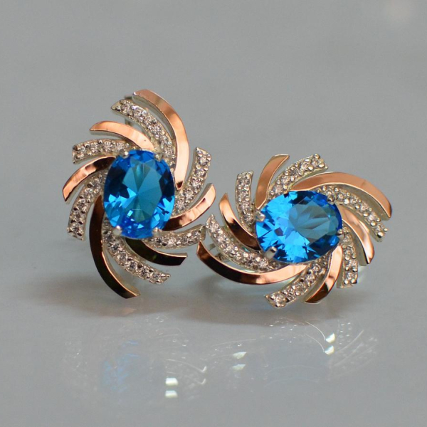 Срібні сережки з золотими вставками