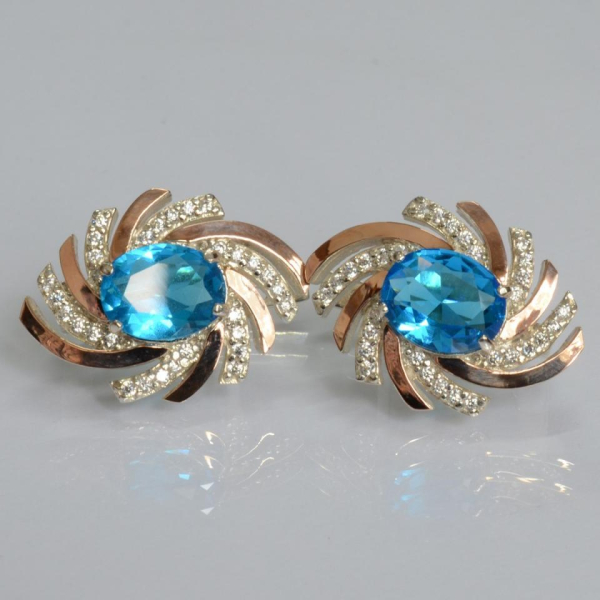 Срібні сережки з золотими вставками