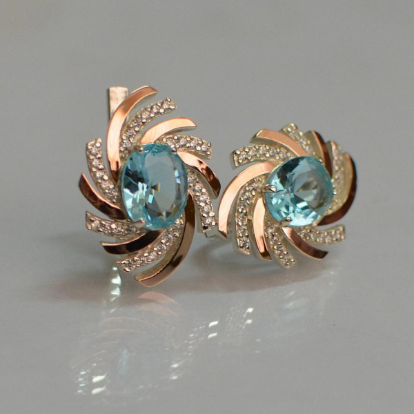 Срібні сережки з золотими вставками