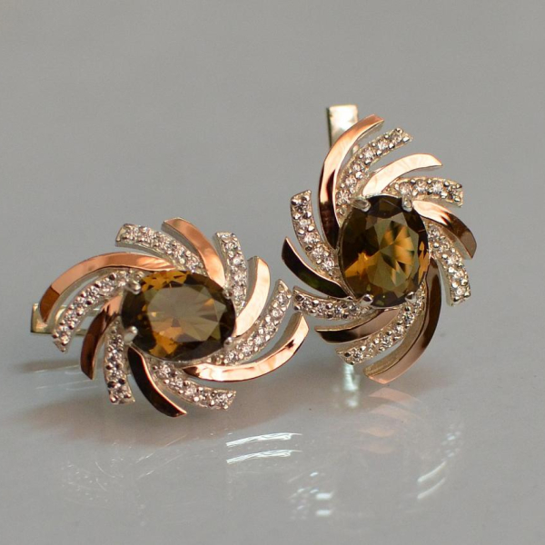 Срібні сережки з золотими вставками