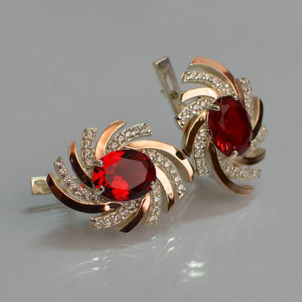 Срібні сережки з золотими вставками