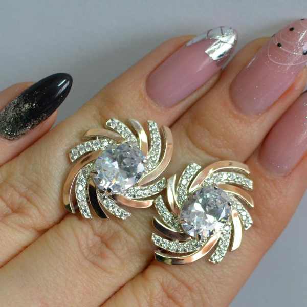 Срібні сережки з золотими вставками