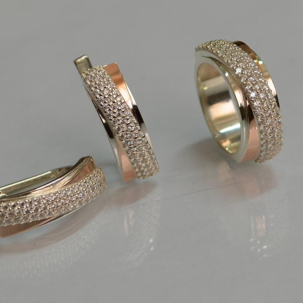 Срібний набір з золотими пластинами