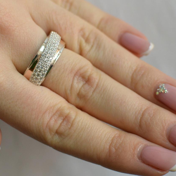 Срібна каблучка з золотими вставками