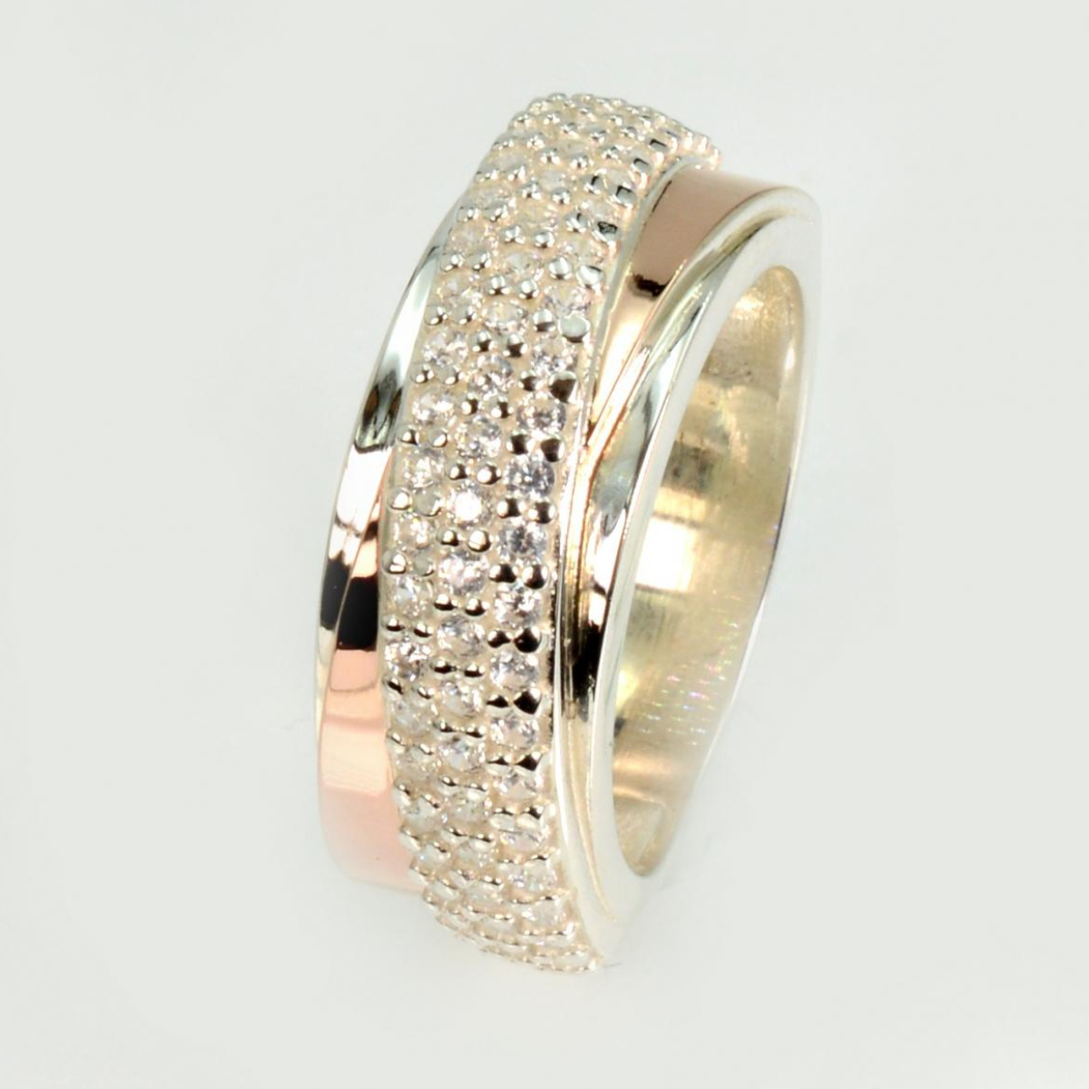 Срібна каблучка з золотими вставками