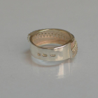 Срібна каблучка з золотими вставками