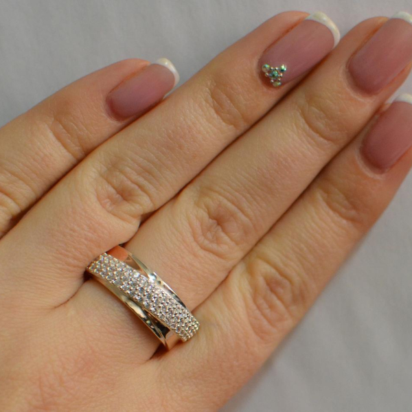 Срібна каблучка з золотими вставками