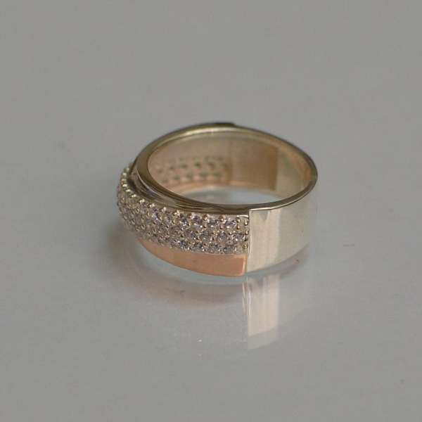 Срібна каблучка з золотими вставками