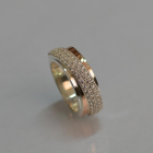 Срібна каблучка з золотими вставками