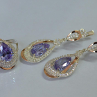 Срібний набір з золотими пластинами