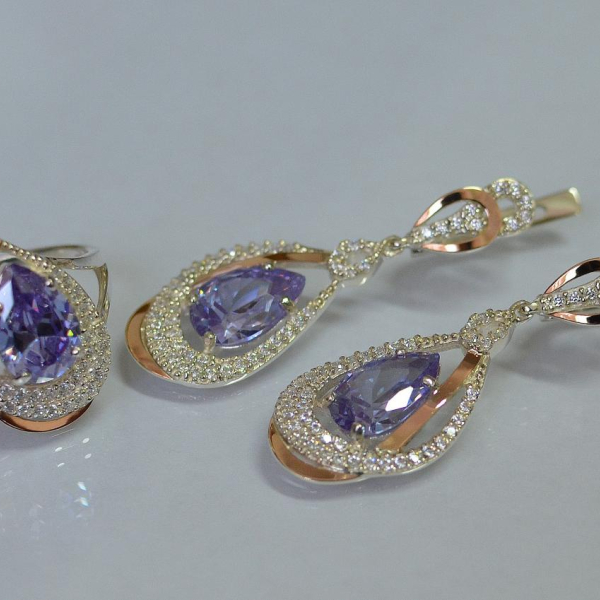 Срібний набір з золотими пластинами