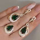 Срібний набір з золотими пластинами