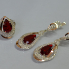 Срібний набір з золотими пластинами