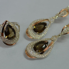 Срібний набір з золотими пластинами