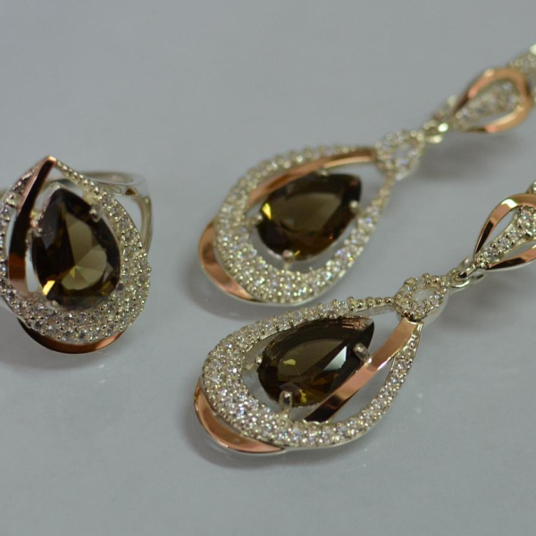 Срібний набір з золотими пластинами