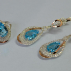 Срібний набір з золотими пластинами