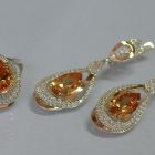 Срібний набір з золотими пластинами