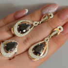 Срібний набір з золотими пластинами