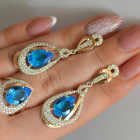 Срібний набір з золотими пластинами