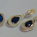 Срібний набір з золотими пластинами