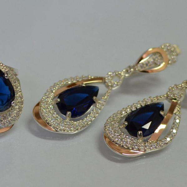 Срібний набір з золотими пластинами