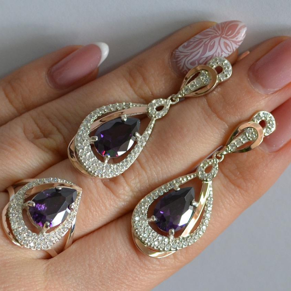 Срібний набір з золотими пластинами