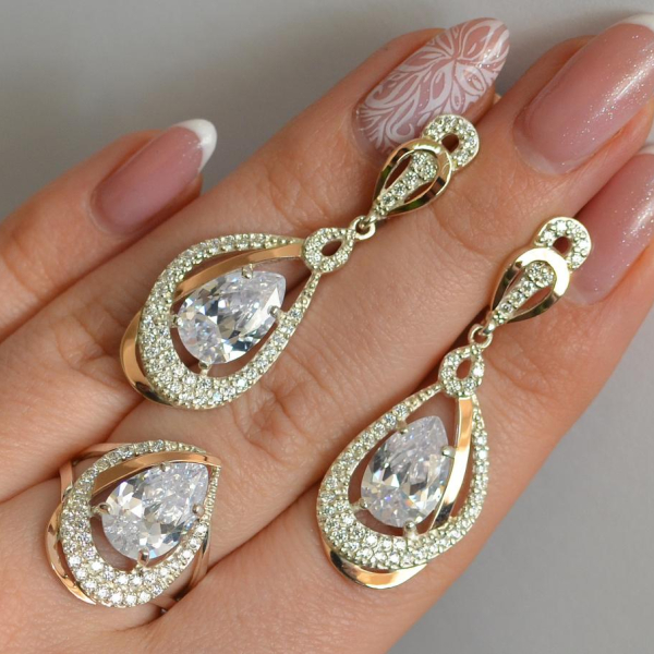 Срібний набір з золотими пластинами