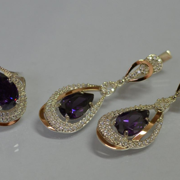 Срібний набір з золотими пластинами