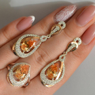 Срібний набір з золотими пластинами