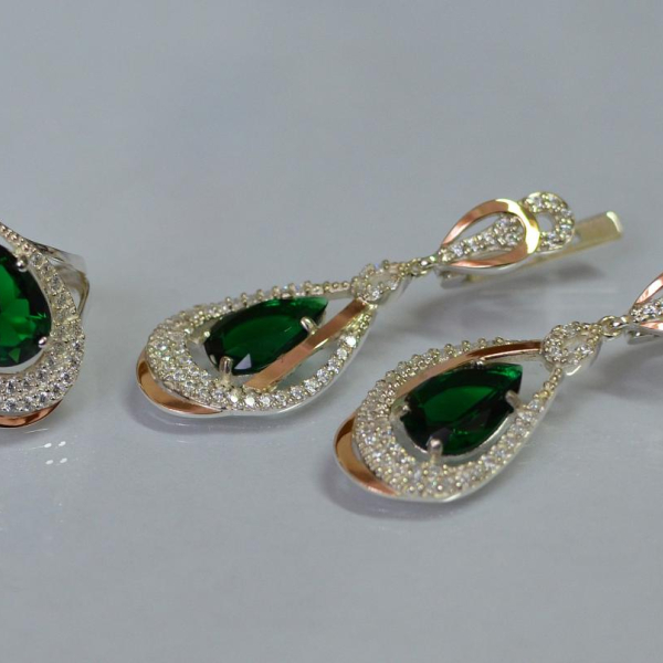 Срібний набір з золотими пластинами