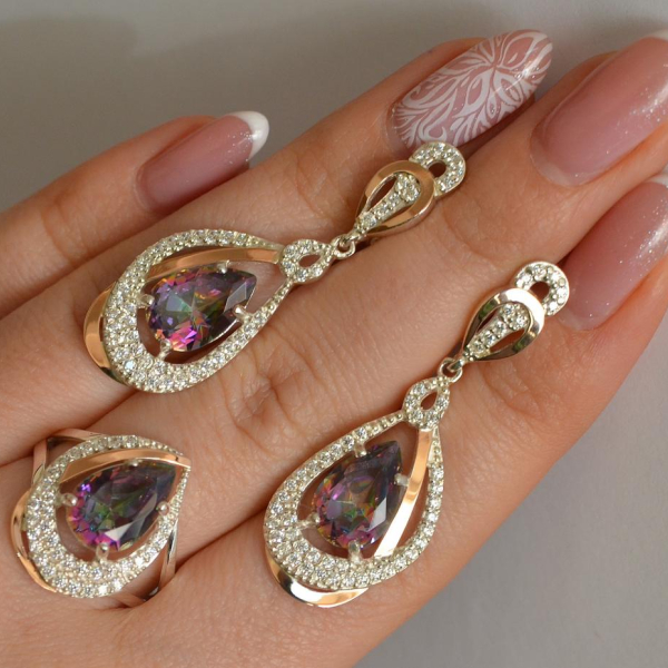 Срібний набір з золотими пластинами